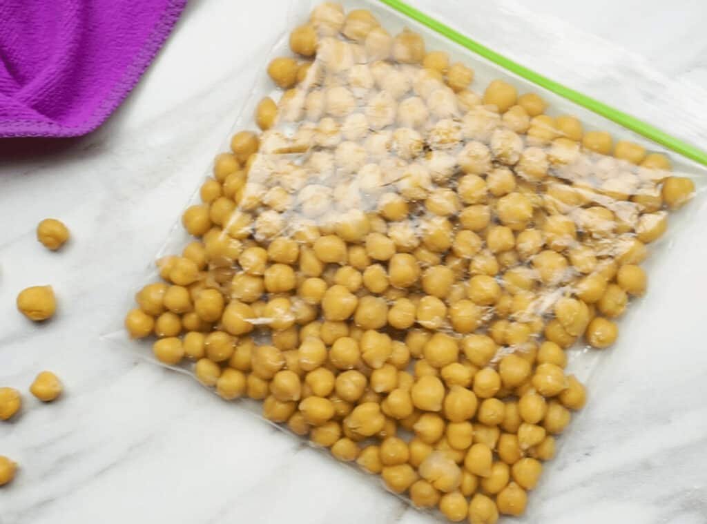 Chickpeas inside a freezer bag, seal tightly ready for the freezer